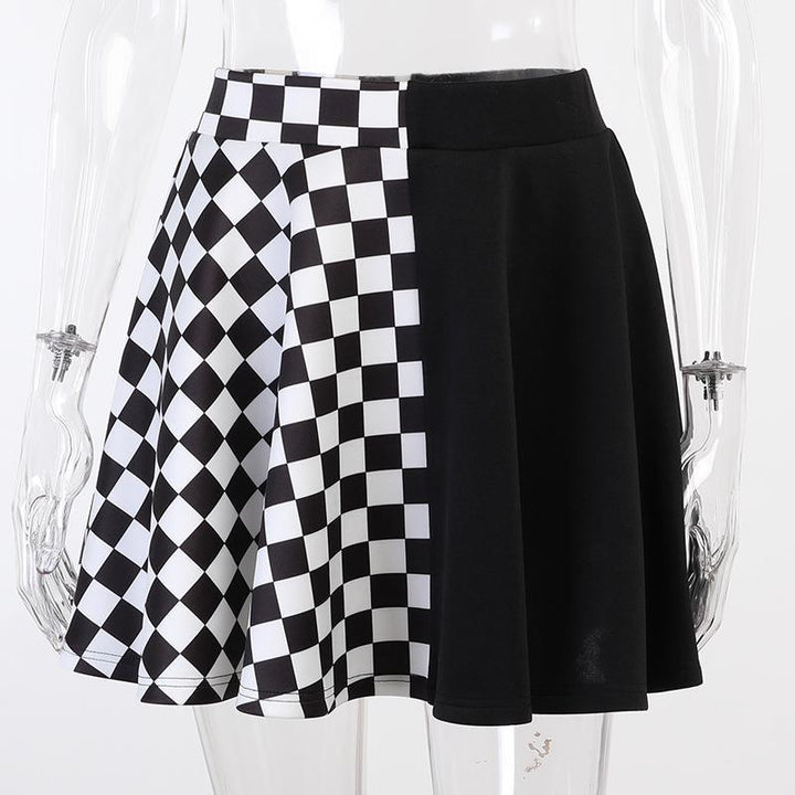 details of a punk gothic black and white check patchwork dress