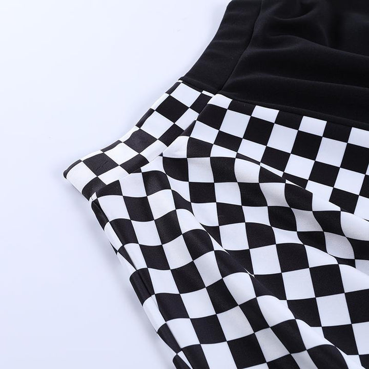 details of a punk gothic black and white check patchwork dress