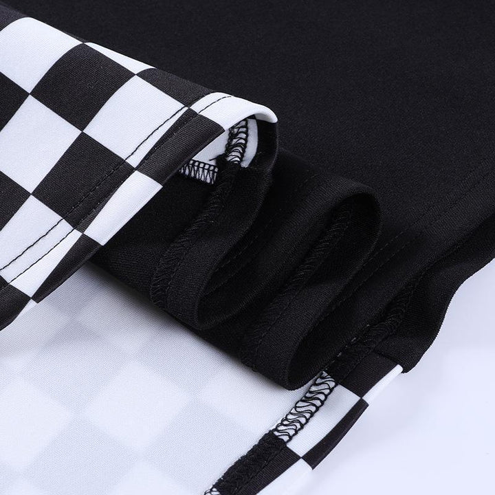 details of a punk gothic black and white check patchwork dress