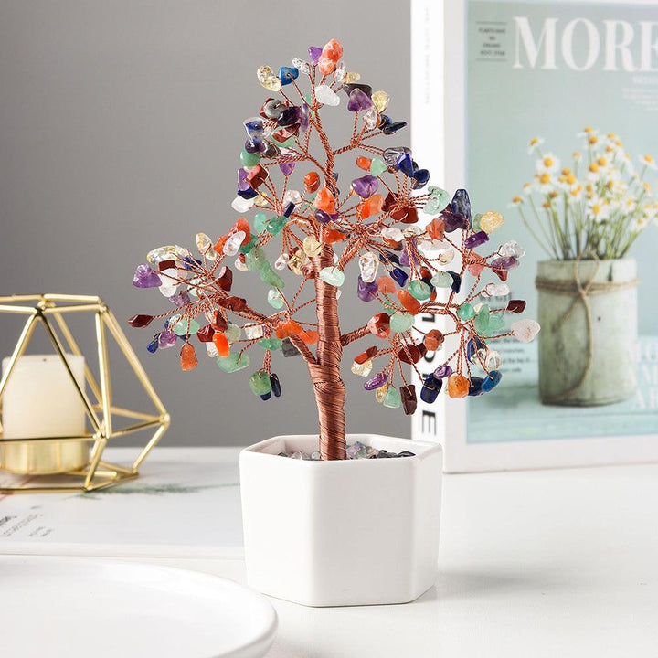 rainbow fluorite crystal bonsai tree with ceramic base on the table