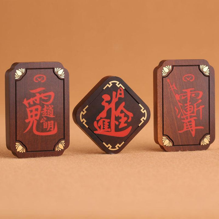 raw cinnabar taoist motifs pendant chinese feng shui necklace on the table