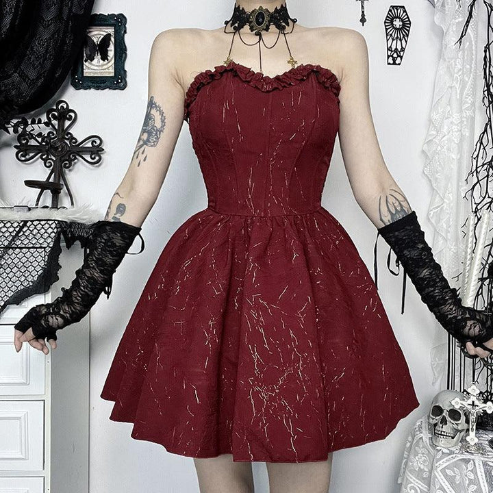 a woman wear a red and black gothic corset bustier dress