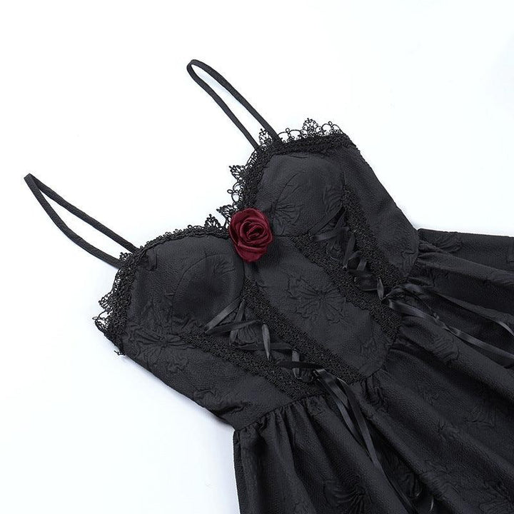 details of a sleeveless short black gothic evening dress