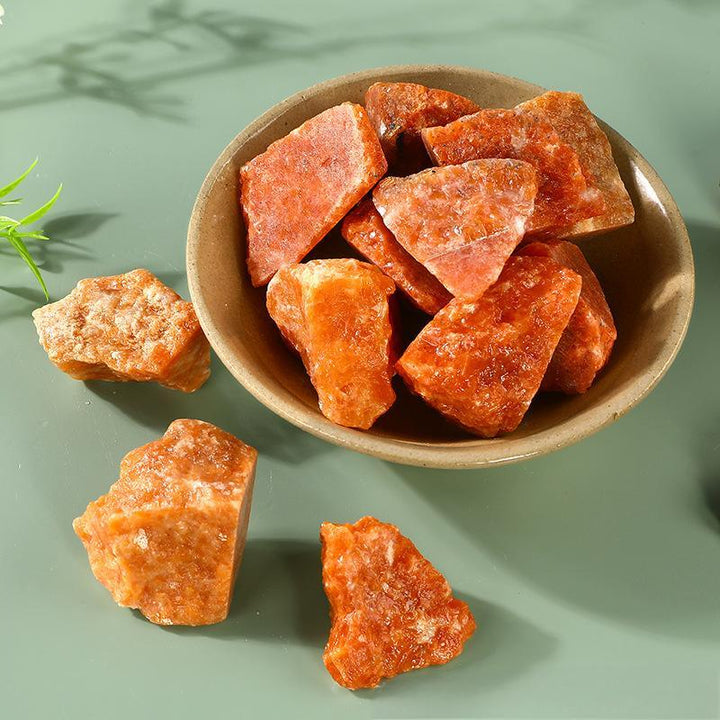 sunstone crystal raw stone aromatherapy incense stone on the table