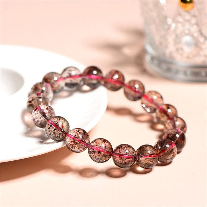 super seven strawberry quartz round beads crystal bracelet