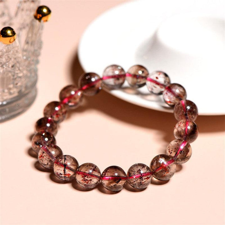 super seven strawberry quartz round beads crystal bracelet