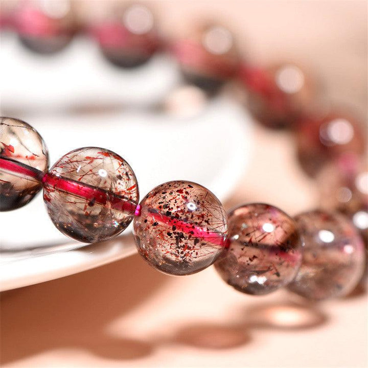 super seven strawberry quartz round beads crystal bracelet