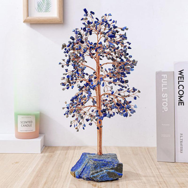 tall crystal bonsai tree with handcrafted copper wire on the table