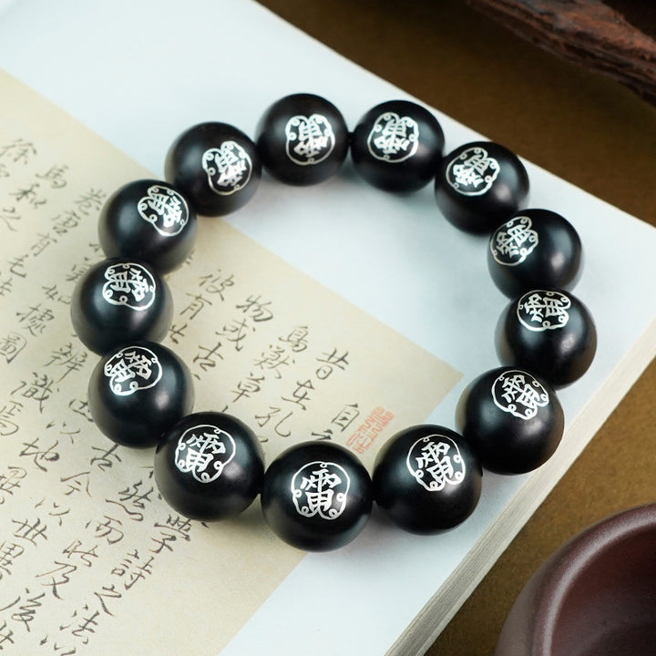 taoist-thunder-symbol-protection-wooden-bead-bracelet-with-silver-inlay-01