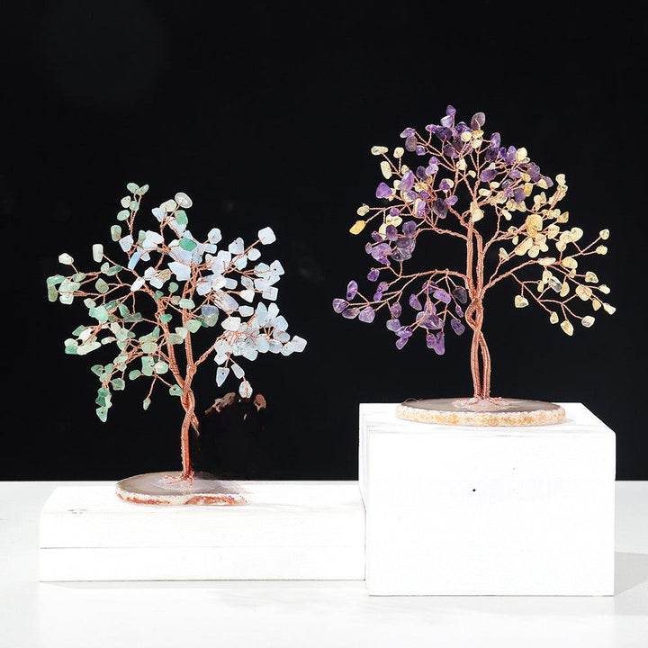 two color couple crystal bonsai tree with agate base on the table