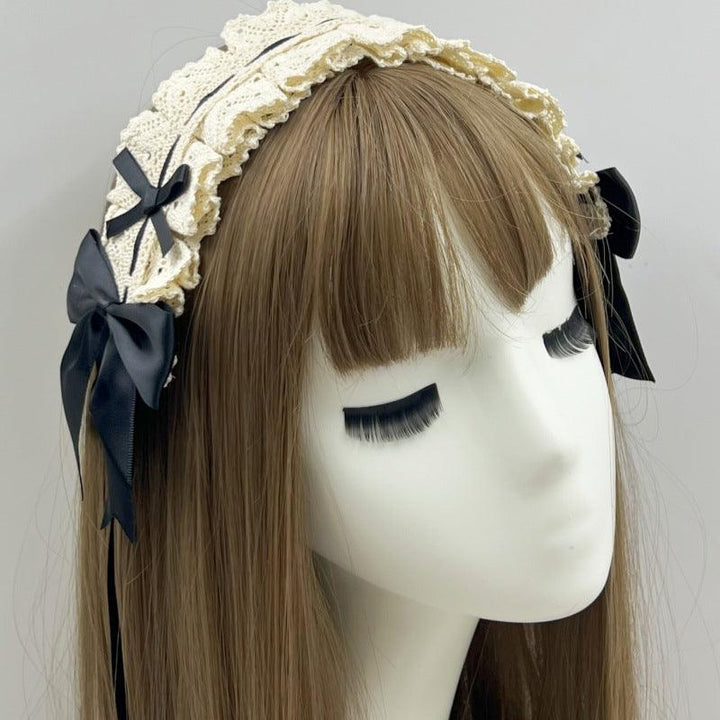 a woman wear a vintage gothic lolita white bow headband