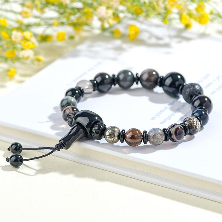 water element bracelet five elements crystal feng shui bracelet on the table