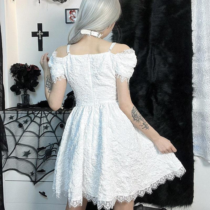 a woman wear a white gothic lolita lace sleeveless short dress