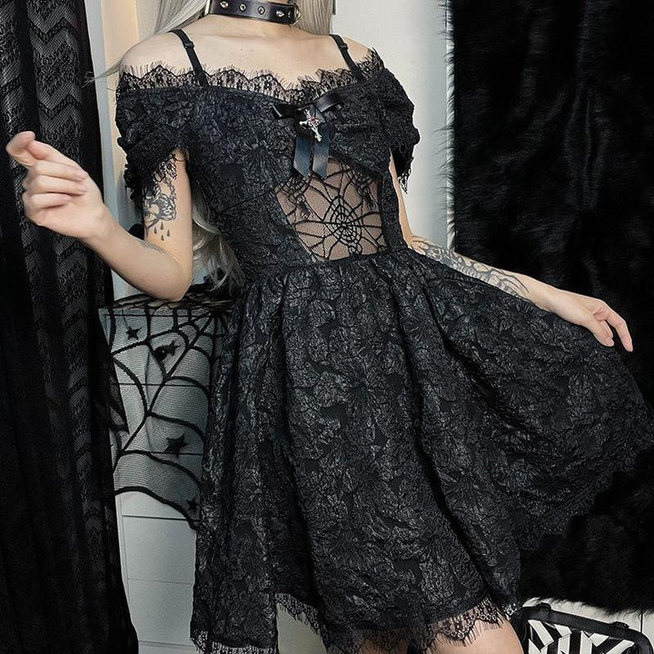 a woman wear a black gothic lolita lace sleeveless short dress