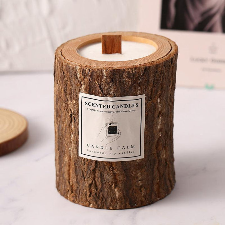 wooden cup aromatherapy scented candle on the table